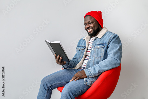 African-American man readin...
