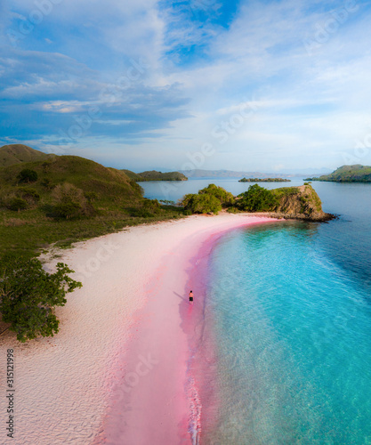 walking on the pink sand beach. Amazing dreamy beach. Lombok, Indonesia, Komodo, Australia