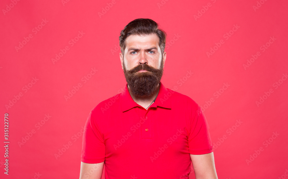 Fashion portrait of man. male beauty and fashion. job of cashier. being trendy and brutal. facial beard care. bearded man casual style. professional barber red background. mature hipster serious look Fashion portrait of man. male beauty and fashion. job of cashier. being trendy and brutal. facial beard care. bearded man casual style. professional barber red background. mature hipster serious look