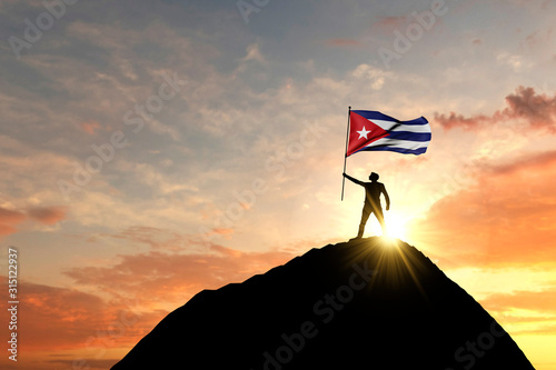 Cuban flag being waved at the top of a mountain summit. 3D Rendering