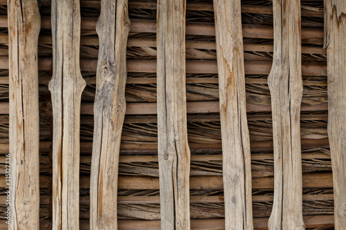 The roof is made of wooden sticks. The texture of the wood. Natural background