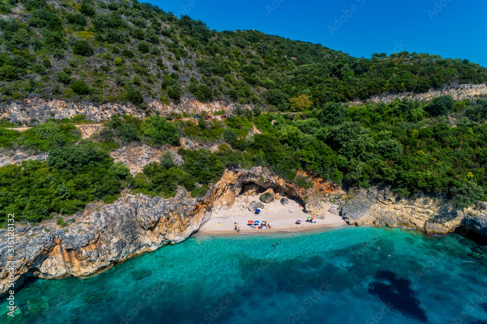 Aerial drone bird's eye view of of Mega Drafi Beach with turquoise sea in Parga area, Ionian sea, Epirus, Greece
