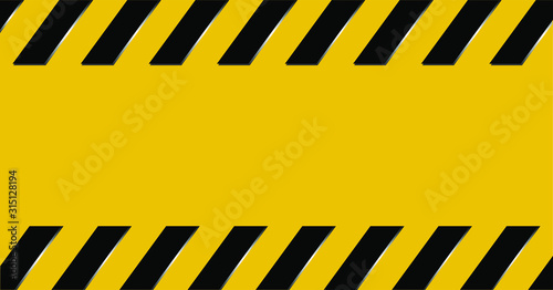 warning sign with black stripes on yellow background.