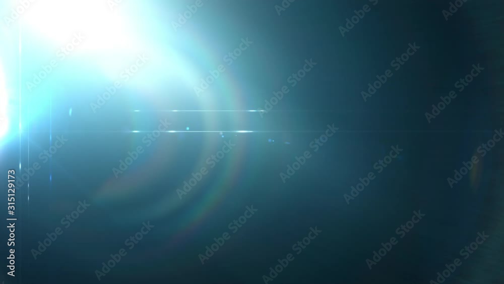 Lens flare light and blue glow moves on a black background. Abstract overlay.