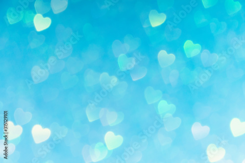 blue valentines day background with hearts bokeh, love concept wallpaper