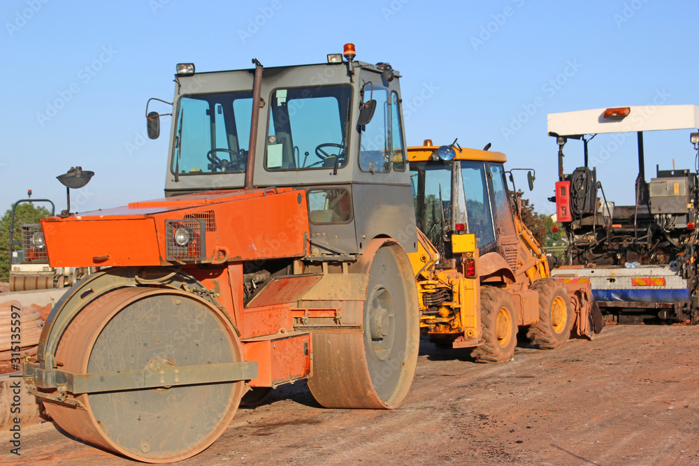 Roller on a road construction site Roller on a road construction site