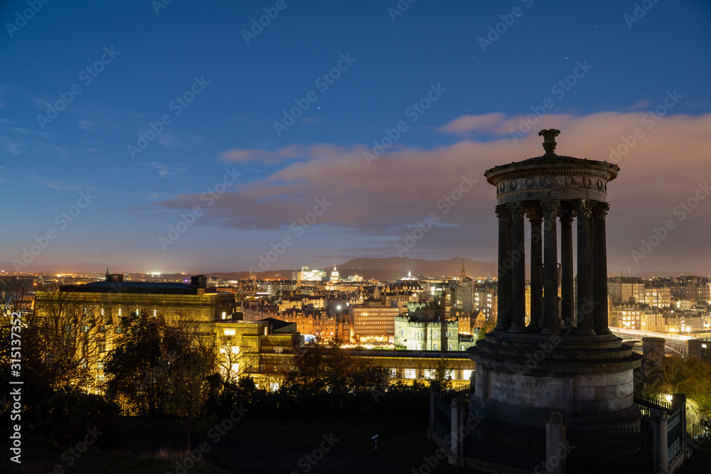 The National Monument and Nelson Monument on Calton Hill on a night light twilight be for sunrise landscape of edinburgh, Scotland , UK
