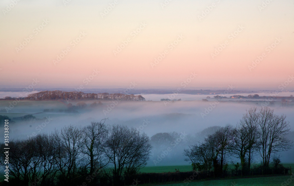 Magical Mist over the rural countryside on a winter evening Magical Mist over the rural countryside on a winter evening