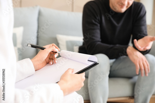 Psychologist working with p...
