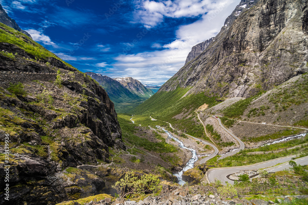 Trollstigen, Norway - June, 2019: Famous norwegian mountains road Trollstigen top view of valley.