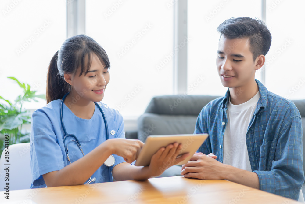 female medicine doctor explains to patient diagnosis pointing with tablets to x-ray picture. Patients listening carefully specialist recommendations. Medical care concept. Radiologist traumatologist female medicine doctor explains to patient diagnosis pointing with tablets to x-ray picture. Patients listening carefully specialist recommendations. Medical care concept. Radiologist traumatologist