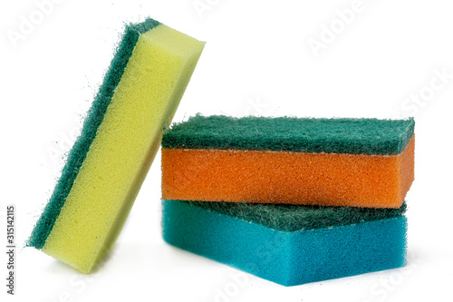 Many colorful sponges for washing dishes. Hygienic sponge isolated on a white background.