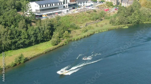 Wallpaper Mural Aerial drone over wakeboarding on lake Torontodigital.ca