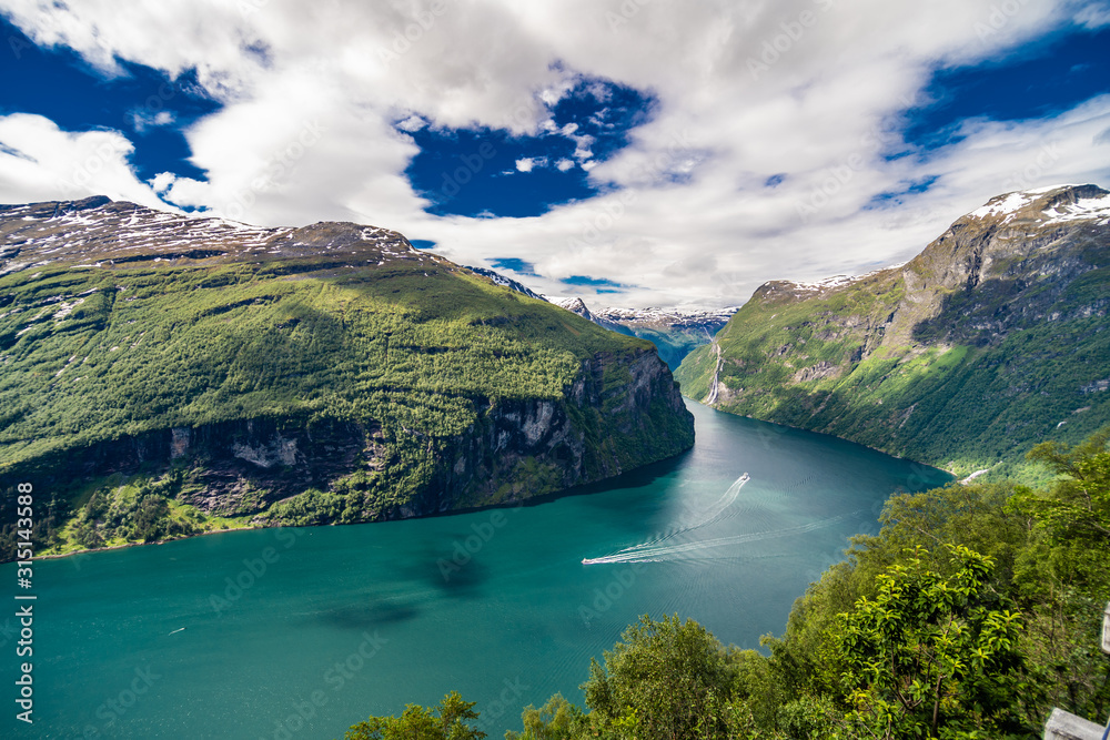 Geiranger fjord, Norway - June,2019: Beautiful Nature Norway 15-kilometre long branch off of the Sunnylvsfjorden, which is a branch off of the Storfjorden Geiranger fjord, Norway - June,2019: Beautiful Nature Norway 15-kilometre long branch off of the Sunnylvsfjorden, which is a branch off of the Storfjorden