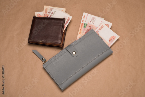 Male and female wallet with money. Wallet with Russian rubles.