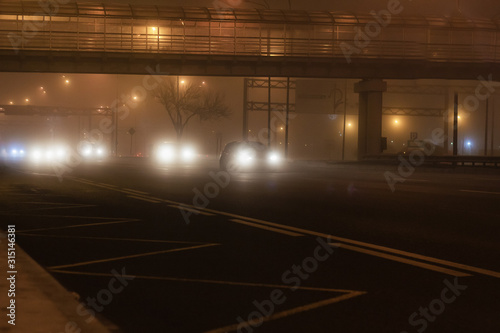 car highway traffic in foggy weather transport danger