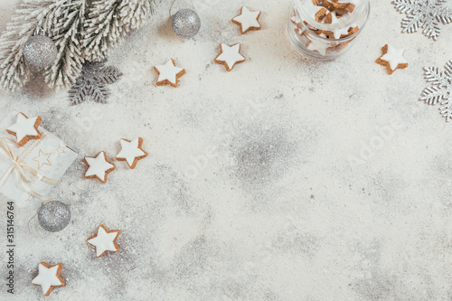 Star shape cookies and Christmas decorations on white background