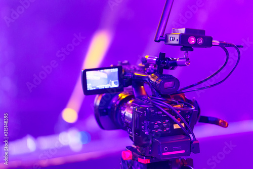 Professional video camera equipment at a concert hall