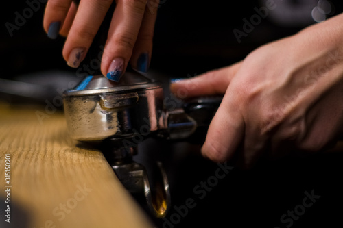 Cappuccino preparation process in coffee shop. Profession barista. The invigorating coffee drink.