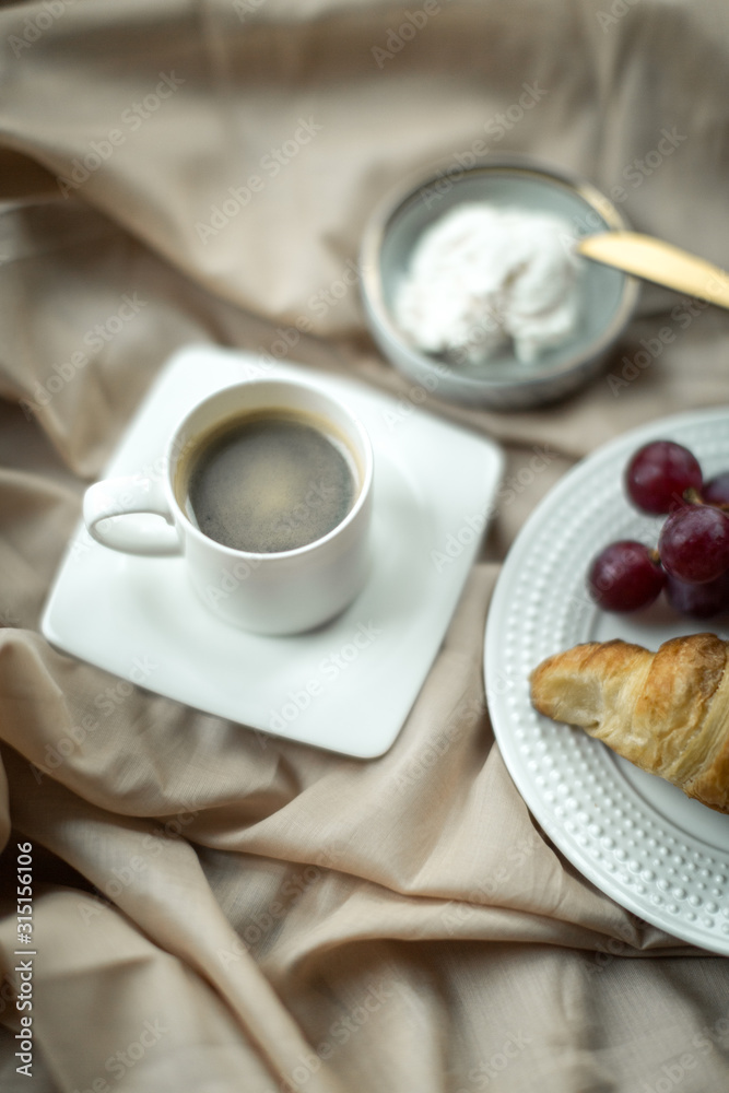 beautiful breakfast with croissant and cheese