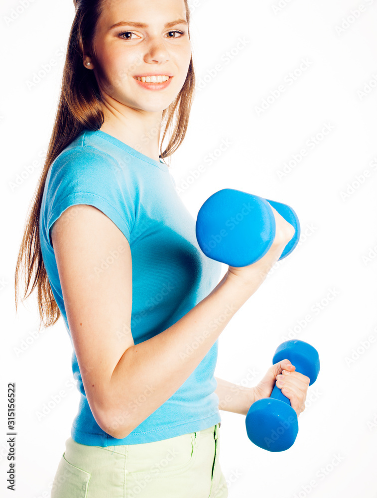 young pretty slim woman with dumbbell isolated on white background, cheerful smiling young pretty slim woman with dumbbell isolated on white background, cheerful smiling