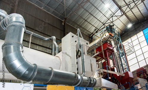 Obraz na płótnie Trybuhivtsi, Ukraine – June 15, 2018: Agroindustrial view with internal structures and equipment of grain elevator in Ternopil region. w salonie