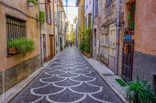 3_ One of the many colourful and quiet streets in Antibes, France.