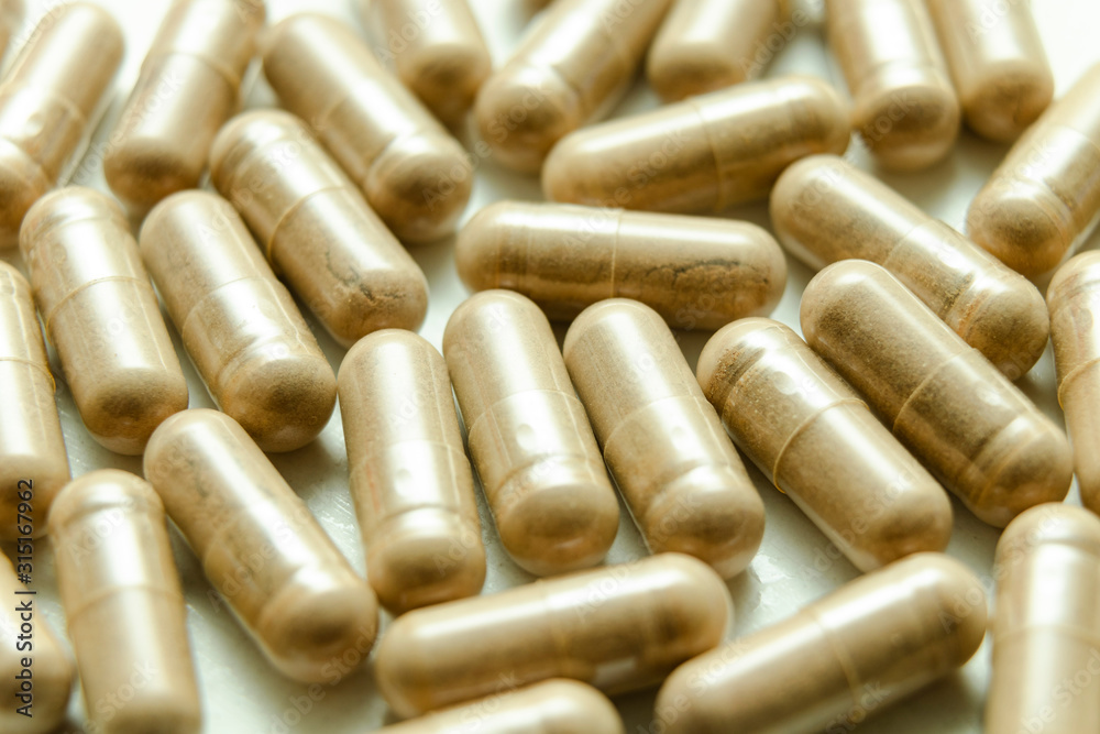 Fish fat. Tablets. The medicine. White background. Meds. Fish fat. Tablets. The medicine. White background. Meds.