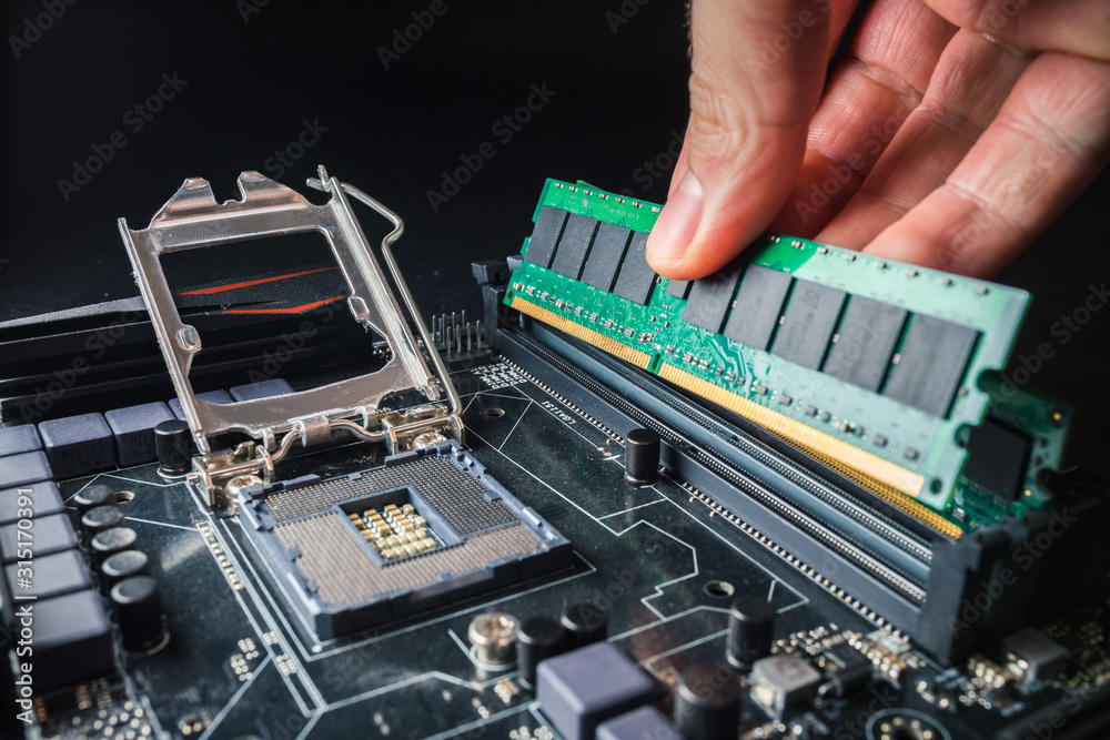 Installing a new RAM DDR memory for a personal computer processor socket in  a service. Upgrade repair. PC upgrade or repair concept. Stock Photo |  Adobe Stock