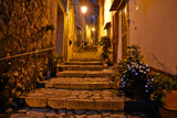 Riardo, Italy, 01/12/2020. A narrow street between the old houses of a medieval village