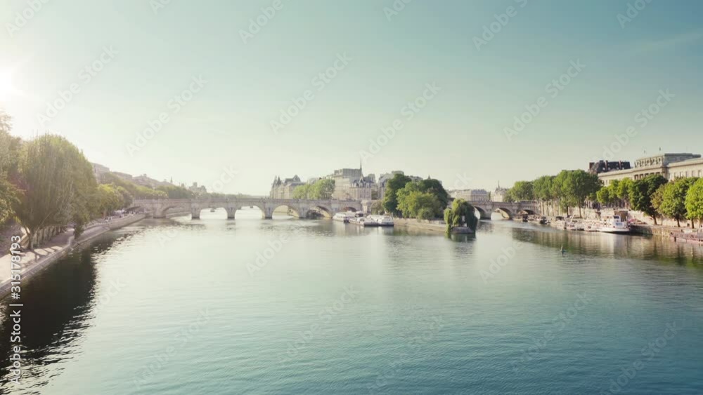 View from the Pont des Arts on old bridge across the Seine river in Paris View from the Pont des Arts on old bridge across the Seine river in Paris