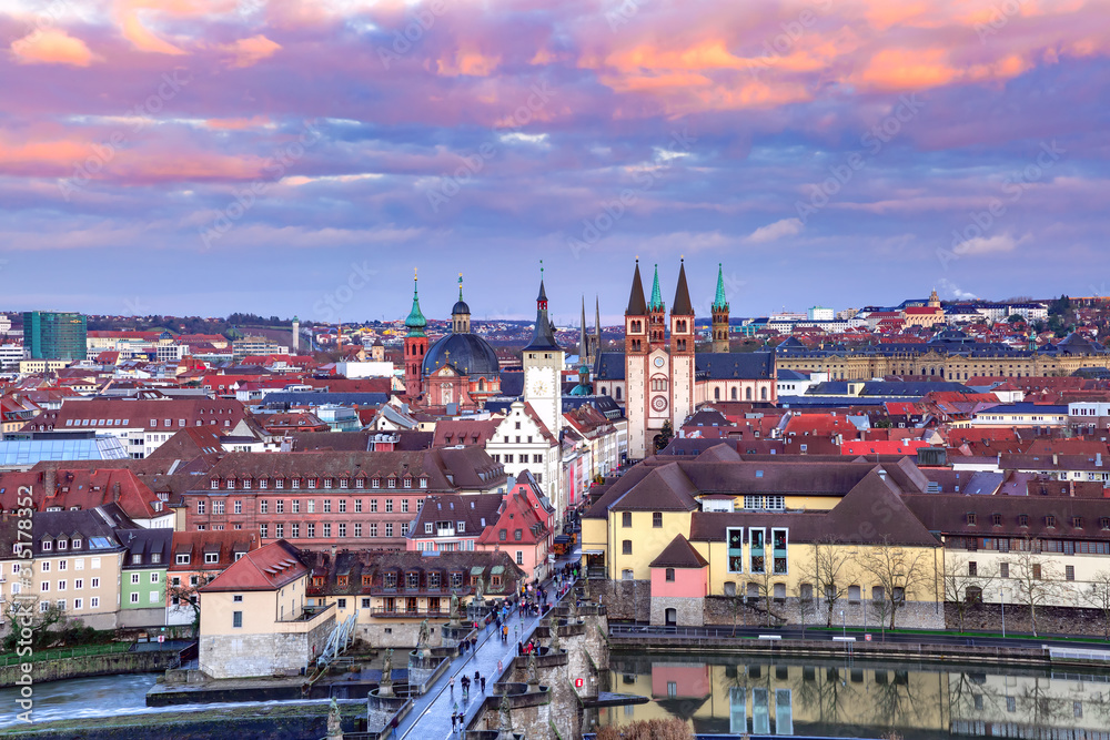 Fototapeta premium Aerial panoramic view of Old Town with cathedral, city hall, Alte Mainbrucke in Wurzburg at sunset, part of Romantic Road, Franconia, Bavaria, Germany
