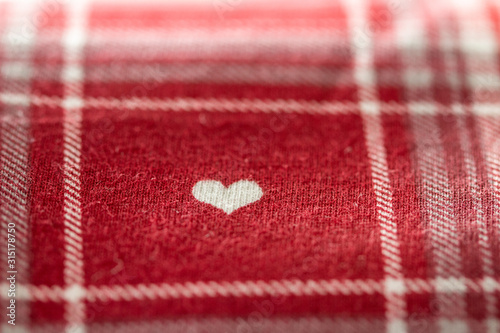 Cloth with a white heart on red
