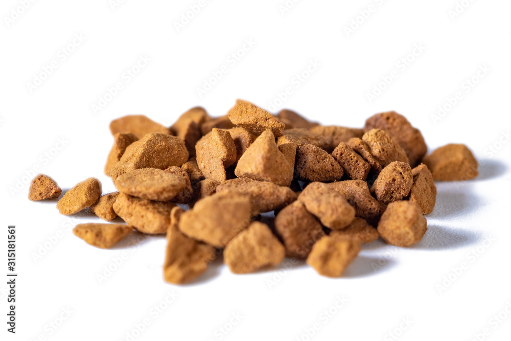Scattered instant coffee on a white background, energetic drink Scattered instant coffee on a white background, energetic drink