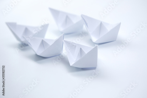 paper boats on the white background