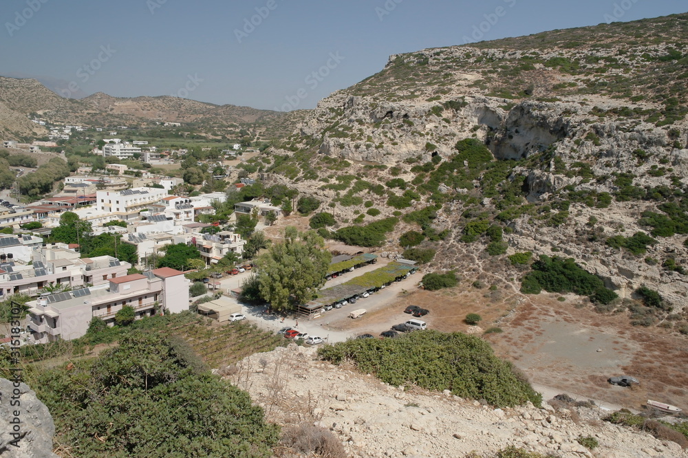 view of the resort of Matala from the top of the mountain, Crete, Greece.