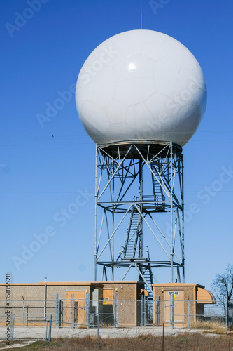 US NOAA weather radar radome cover mounted on support tower