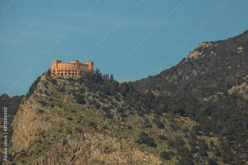 View of the Castello utveggio on the hill of Pellegrino, Sicily, italy on a clear sunny day.