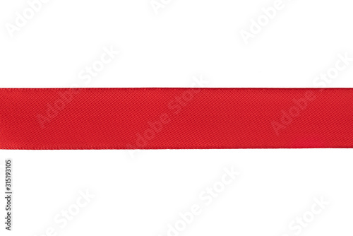 Horizontal red ribbon isolated on white background. Preparation for the designer. Top view. Close-up