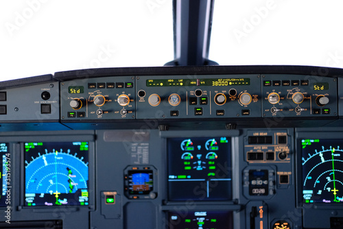 Jumpseat view of the cockpit of an Airbus A320 in flight
