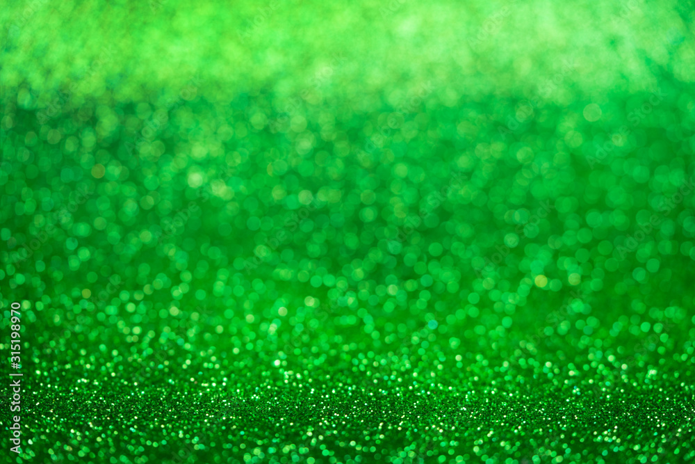 Green bokeh,circle abstract light background, shining lights. Blurred abstract holiday background. Green bokeh,circle abstract light background, shining lights. Blurred abstract holiday background.