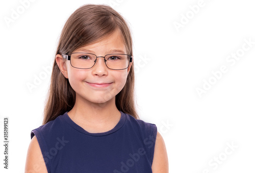 Portrait of a little girl with glasses isolated on a white backgroud.