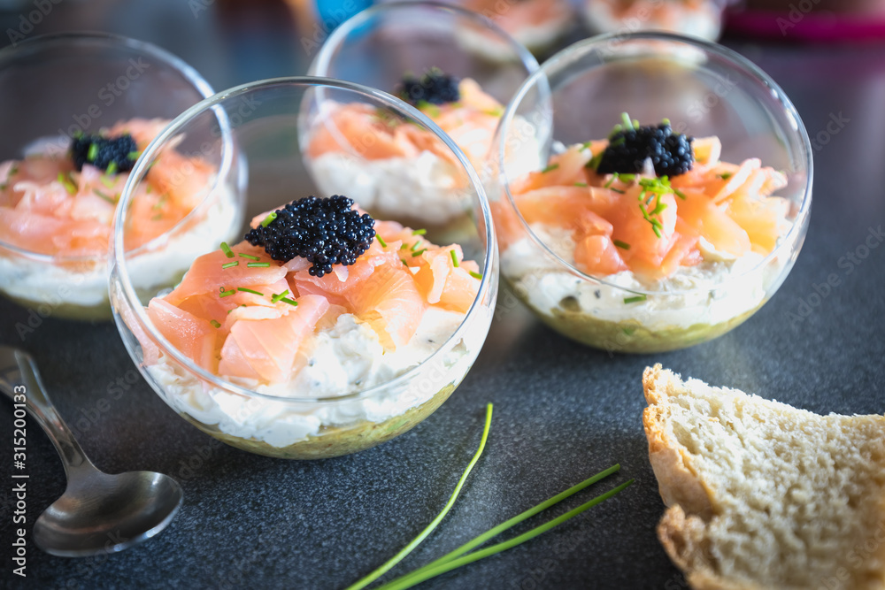 verrine salmon lumpfish egg fresh cheese and avocado bed