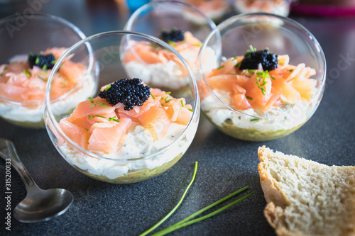 Obraz na płótnie verrine salmon lumpfish egg fresh cheese and avocado bed w salonie