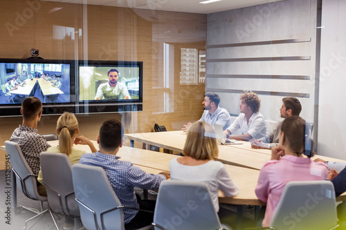 Business people in video conference meeting photo