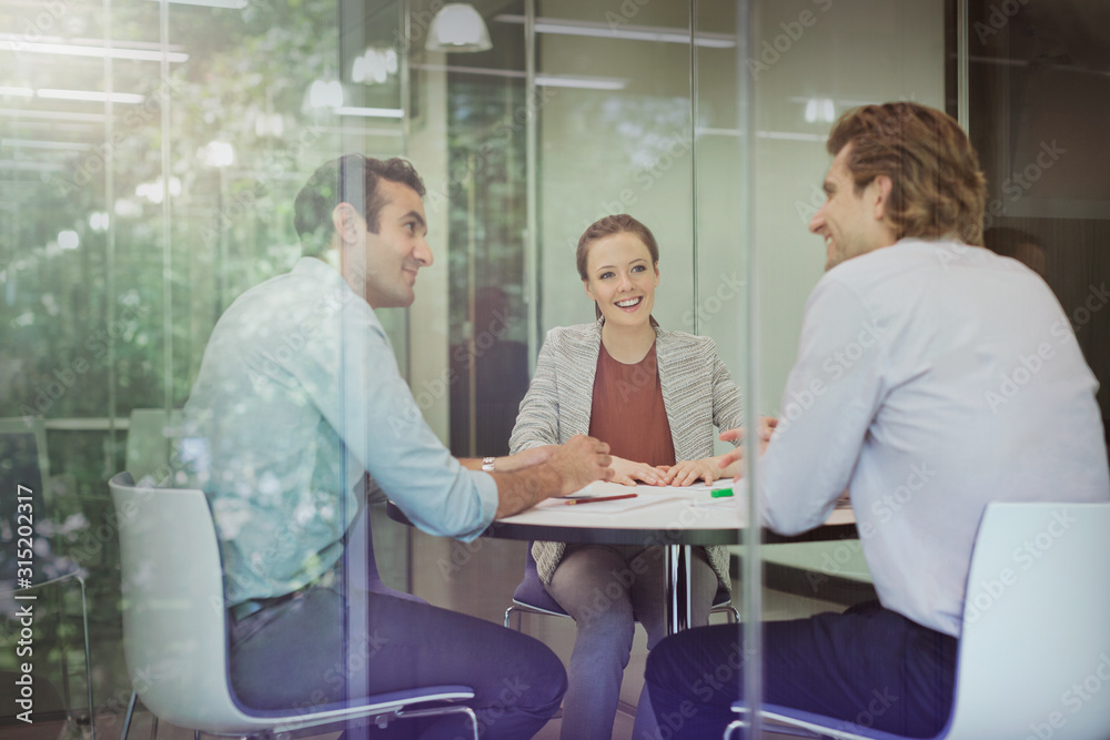 Business people talking in conference room meeting Business people talking in conference room meeting