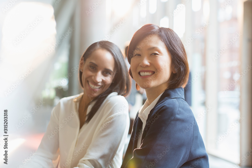 Portrait confident smiling businesswomen Portrait confident smiling businesswomen