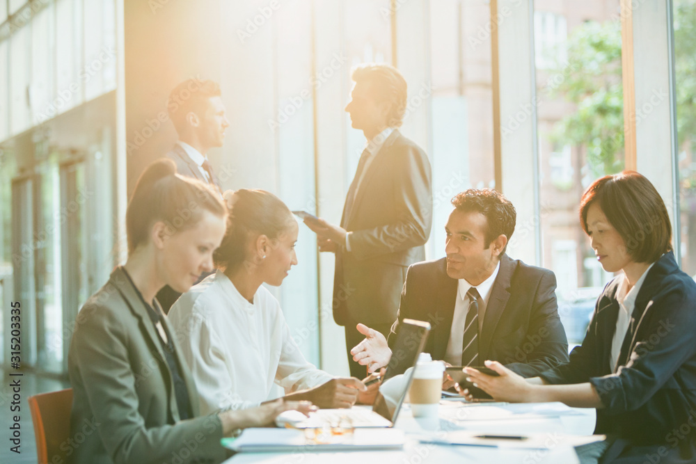 Business people talking in meeting Business people talking in meeting