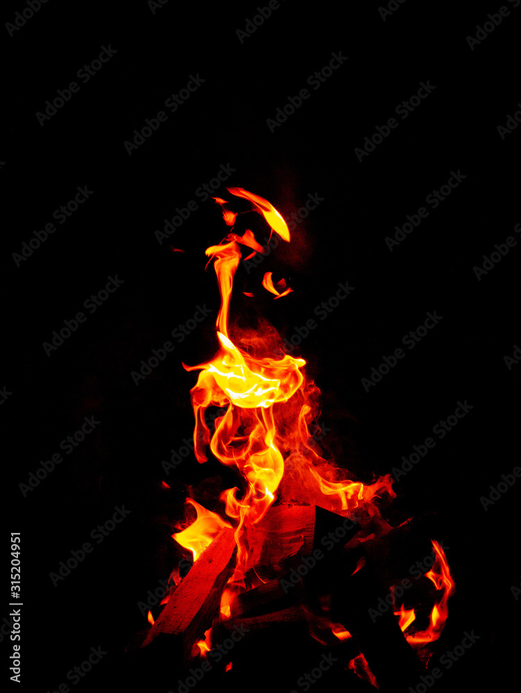 Flame of fire against black background, Flames resemble Chinese dragon.