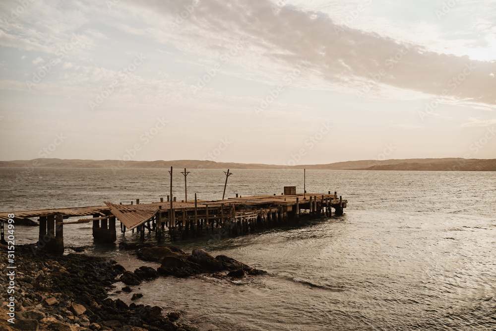 lonely old pier at Luderitz, Namibia a tourist town popular for its diamond mining